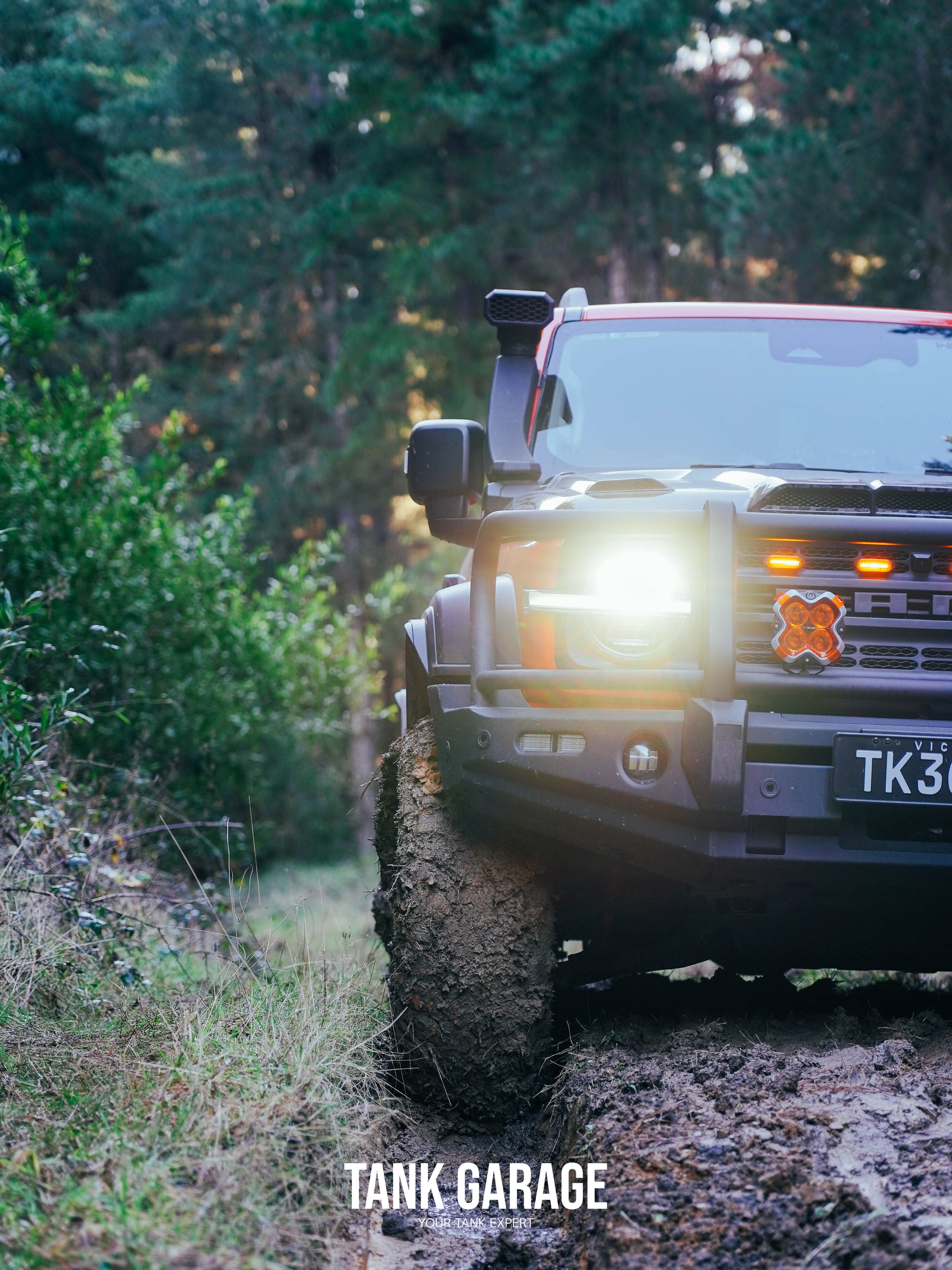 Tank Garage TANK 300 with Wheel Arches, navigating off-road terrain.