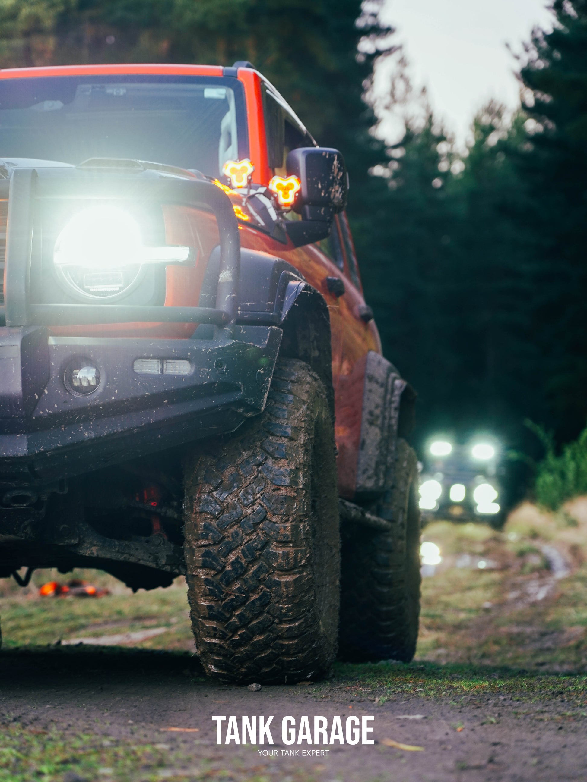 Tank Garage TANK 300 with Wheel Arches, navigating off-road terrain.