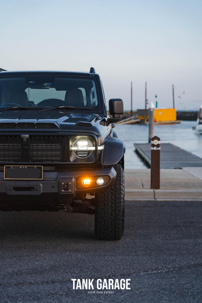 The black GWM TANK 300 with Body Kit "Knight" with the head light and fog light on