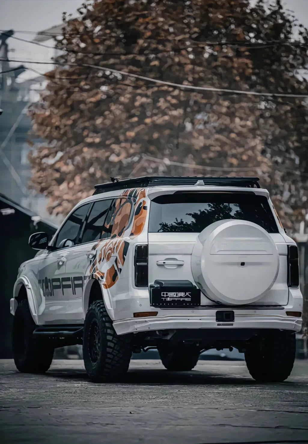 A white TANK 500 with Top Fire Rear Bumper "Darkness"